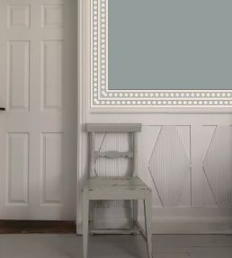 Harlequin Border Wallpaper by Ottoline Light Blue
