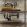 The Machinist Wallpaper by MINDTHEGAP Brass,Taupe