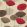 Dandelion Clocks Wallpaper by Sanderson Red