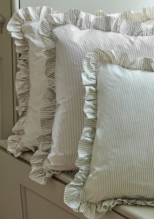 Ruffled pillows in Pinstripe fabric by James Hare